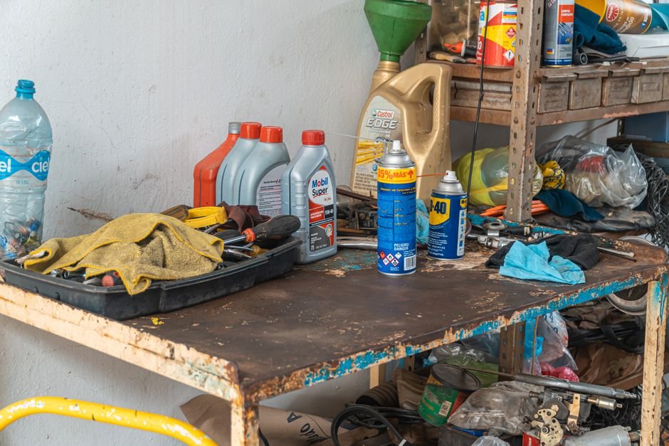 A close-up shot of a high-quality new rubber rear main seal sitting on a mechanic's workbench