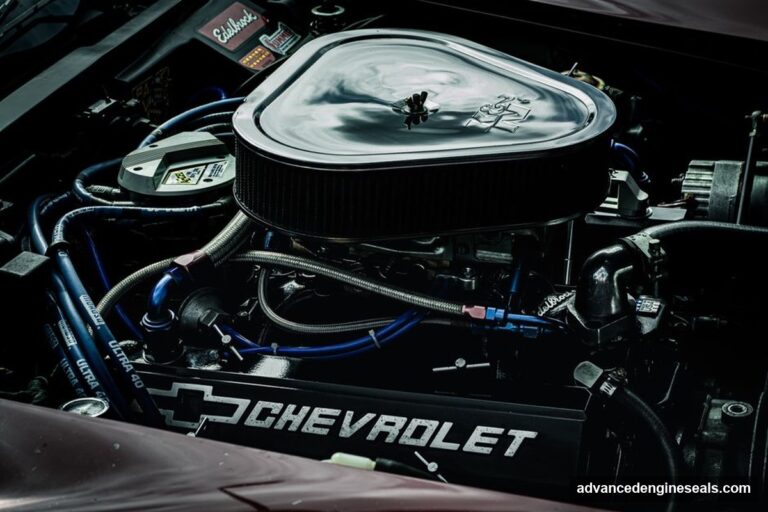 A professional mechanic diagnosing an engine for intake manifold gasket symptoms in a high-end workshop